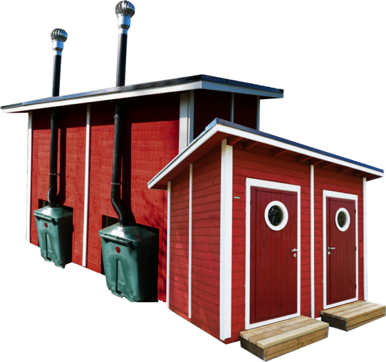 Two red wooden outhouses with Green Toilets.